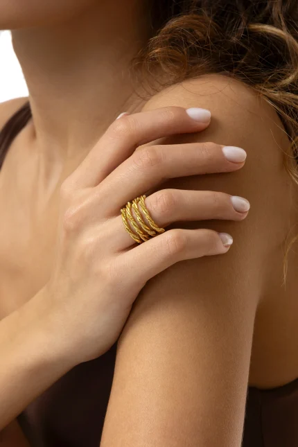 ANELLO FASCIA MULTILINEE INTRECCIATE